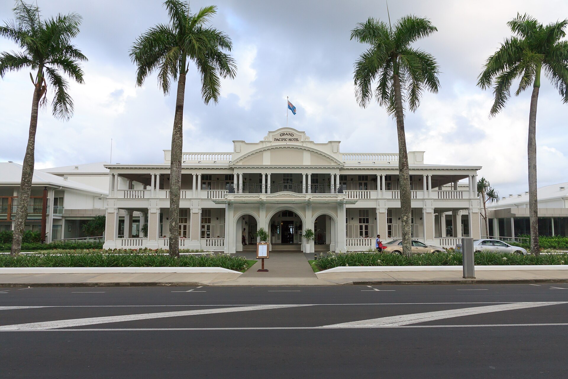 The white colonial facade of the Grand Pacific Hotel on the Suva waterfront, Fiji
